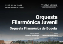 Solist Dominik Hellsberg in Bogotá / Botschaft Bogotá Das Bild zeigt das Werbematerial für den Konzertauftritt von Dominik Hellsberg im Teatro Mayor Julio Mario Santo Domingo mit dem Instrumente haltenden Orquesta Filarmónica Juvenil von Bogotá.