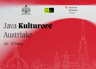 Österreichische Kulturwoche in Albanien / Botschaft Tirana Das Bild zeigt eine mit einem Strich gefertigte Zeichnung der Stadt Wien mit dem Stephansdom und weiteren herausstechenden Gebäuden vor einem roten Hintergrund.