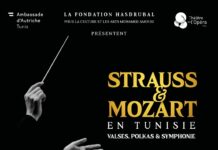 Österreichisch-Tunesisches Orchesterkonzert / Botschaft Tunis Das Bild zeigt einen Dirigentenstab sowie die Sponsorenlogos in der Fußzeile.