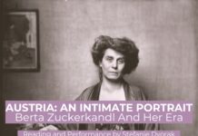 Berta Zuckerkandl: An Intimate Portrait / Kulturforum New York Das Bild zeigt ein historisches Schwarz-Weiß-Porträt der österreichischen Salonnière Berta Zuckerkandl, die in einem Sessel sitzt. Sie trägt ein langes, gemustertes Kleid mit einem locker übergeworfenen Mantel. Ihr Blick ist direkt auf die Kamera gerichtet, der Gesichtsausdruck ernst und zugleich nachdenklich. Im Hintergrund hängt ein gerahmtes Kunstwerk an der Wand. Über das Foto sind violette Textfelder mit weißer Schrift gelegt. Sie enthalten folgende Informationen: AUSTRIA: AN INTIMATE PORTRAIT; Berta Zuckerkandl And Her Era; Reading and Performance by Stefanie Dvorak; November 20, 2025 | 6:30 PM Austrian Cultural Forum New York. Das Design wirkt schlicht und elegant, mit Fokus auf die historische Fotografie und einer klaren, gut lesbaren Typografie.