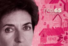 Ruth Beckermann-Retrospektive / Botschaft Bogota Das Bild zeigt ein Schwarz-Weiß Porträt der Filmemacherin Ruth Beckermann vor einem pinken, grafischen Hintergrund. Hervorgehoben wird die Retrospektive ihrer Filme im Rahmen des Festival Internacional de Cine de Cartagena de Indias sowie in der Cinemateca de Bogotá